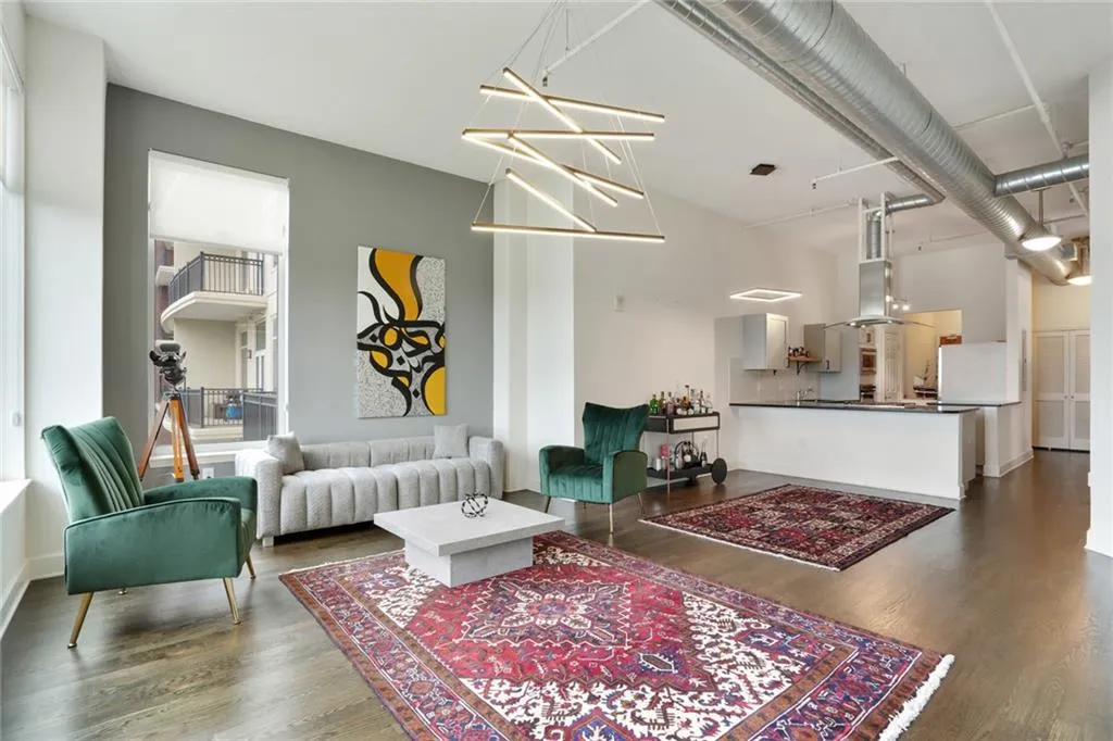 Living area featuring dark wood-type flooring