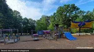 Community jungle gym featuring view of scattered trees