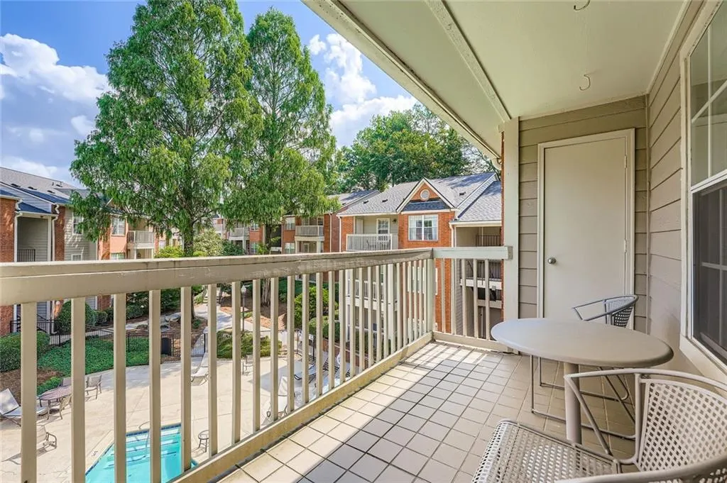 Balcony featuring a residential view