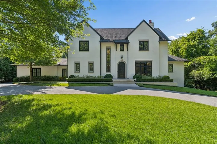 Level front yard with circular drive