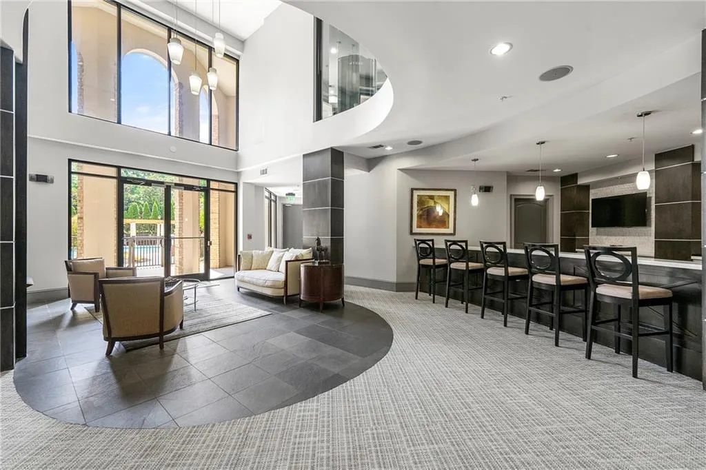 The spacious clubroom has several seating areas and wi-fi throughout, and includes catering kitchen