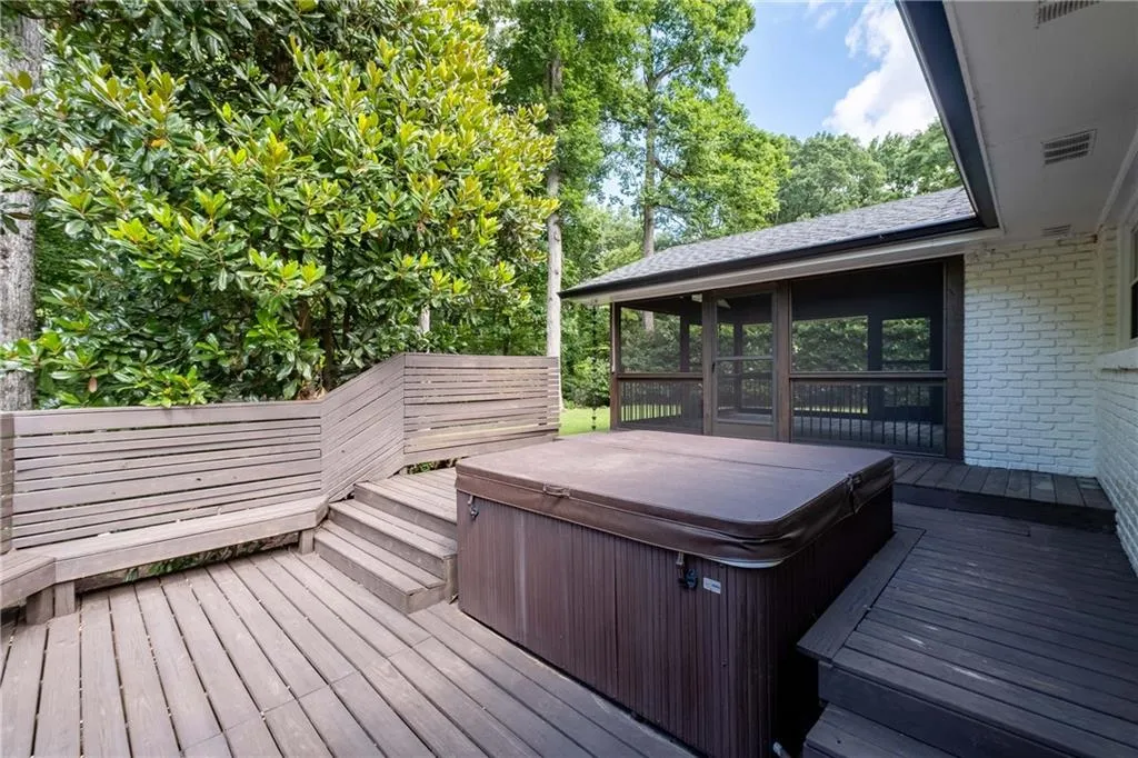 Walk out from your screened in deck to your hot tub!