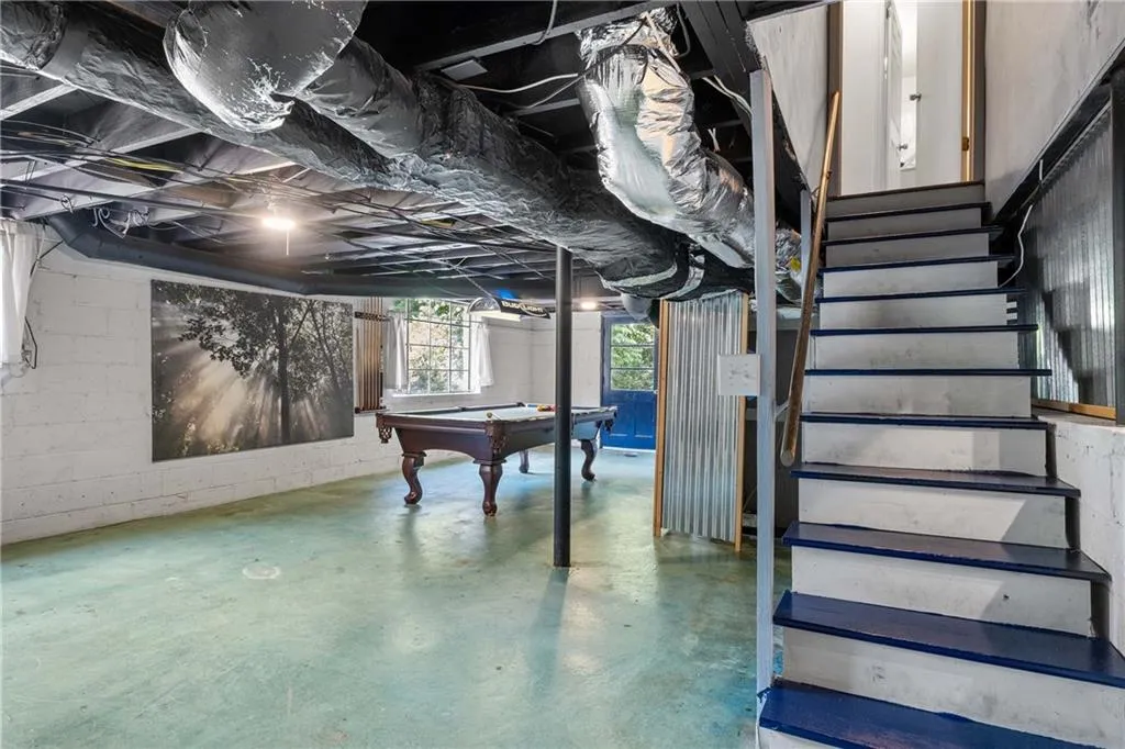 Light and bright unfinished basement-- perfect for storage, work room, gym, etc.