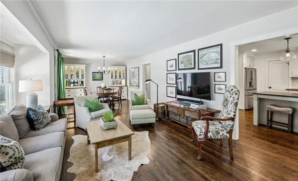 Living room with hardwood floors and great natural light.