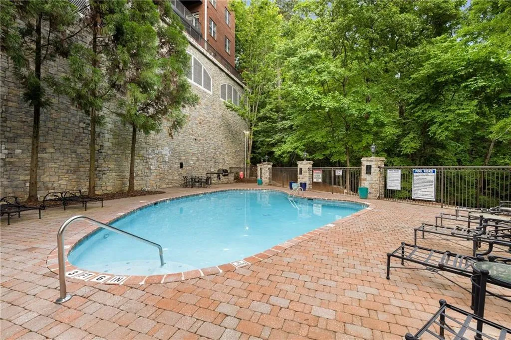 The saltwater swimming pool has a grilling area and in the Spring, Summer and Fall there is lots of comfortable furniture for the residents and their guests!