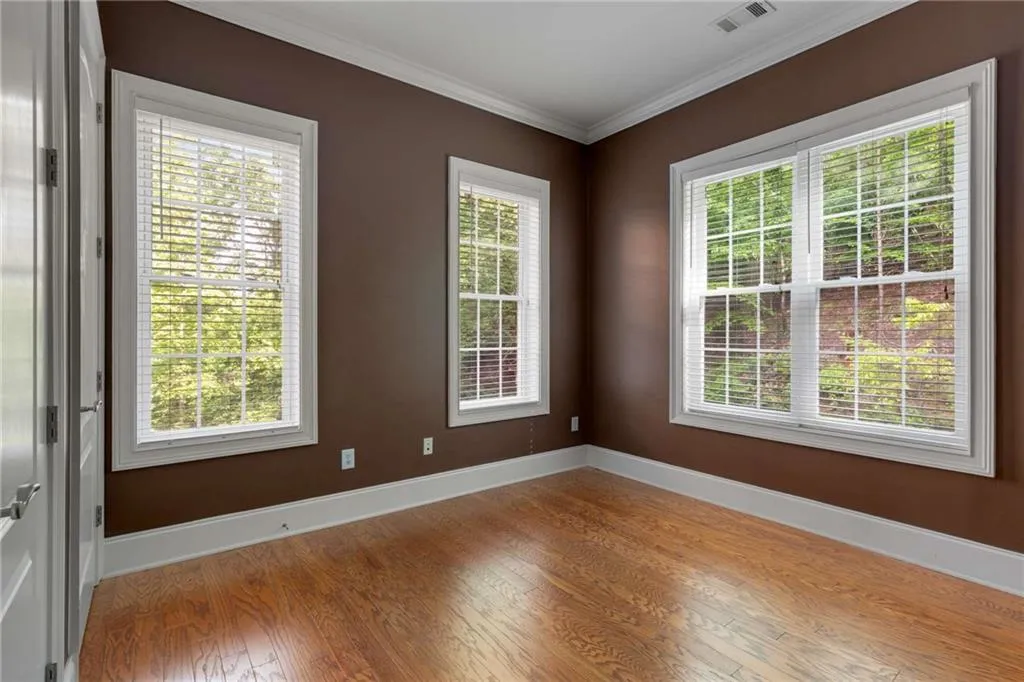 The second bedroom has windows on 2 walls and an ensuite bathroom.  This room was most recently used as an office.