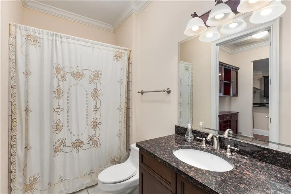 This is the ensuite bathroom for the 3rd bedroom.  It also has a tub/shower combination.