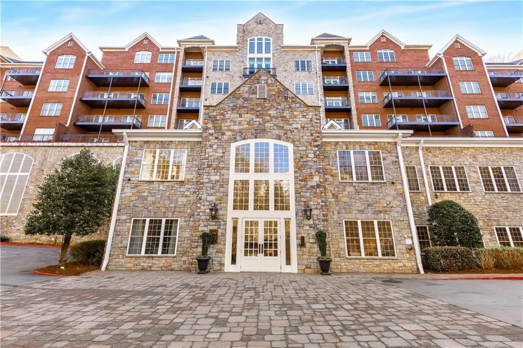 This is the entrance to Greystone's lobby and amenities building. You can park anywhere along the red painted curbs or either side (but not blocking) the double white doors which open to the entrance lobby and Concierge desk.