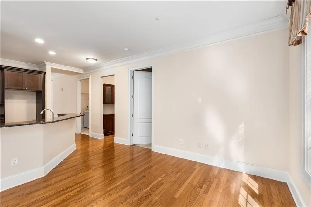 This view from the Keeping Room shows the door to the 3rd bedroom and the Butler's Pantry.