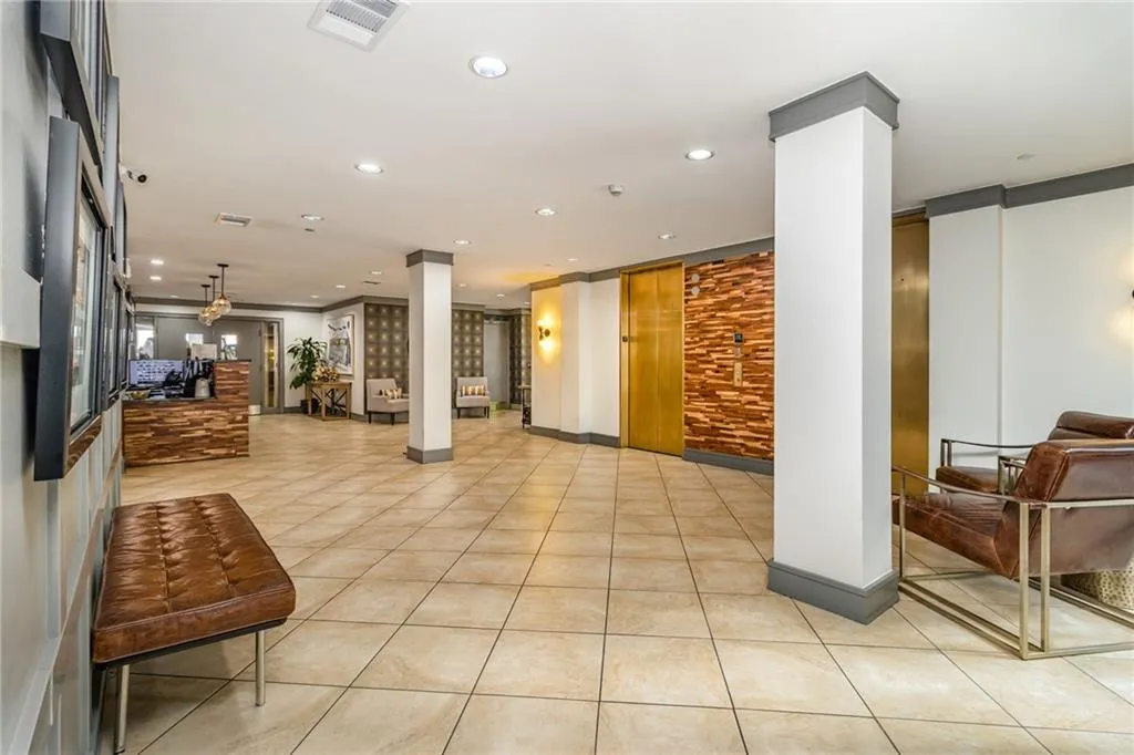 Lobby featuring recessed lighting and ornamental molding
