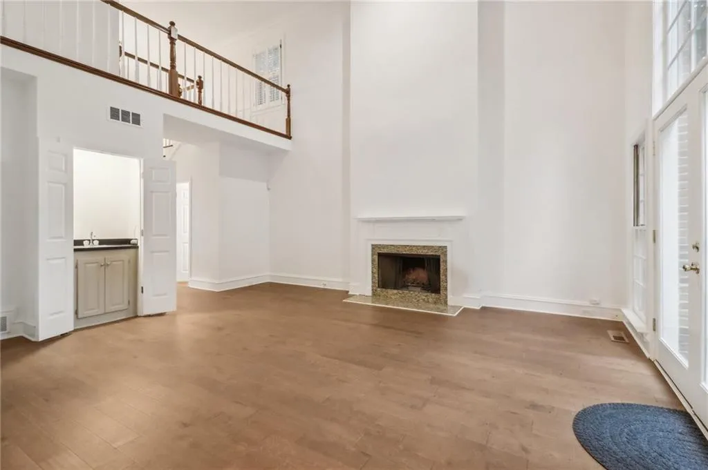 Fireplace and wet bar accent the living areas