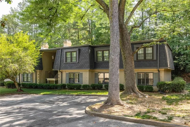 Rare step-less entry from the parking lot to this corner unit!