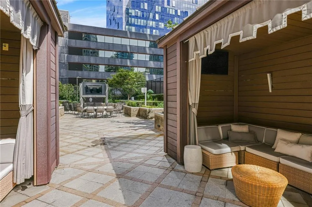 View of patio featuring an outdoor hangout area