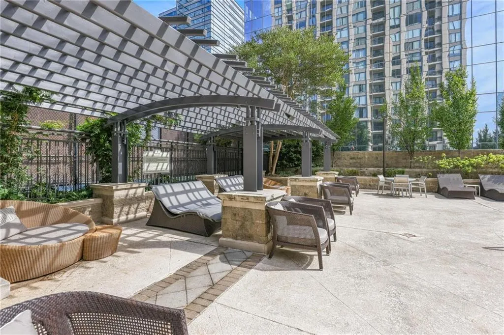 View of patio with a pergola and an outdoor hangout area