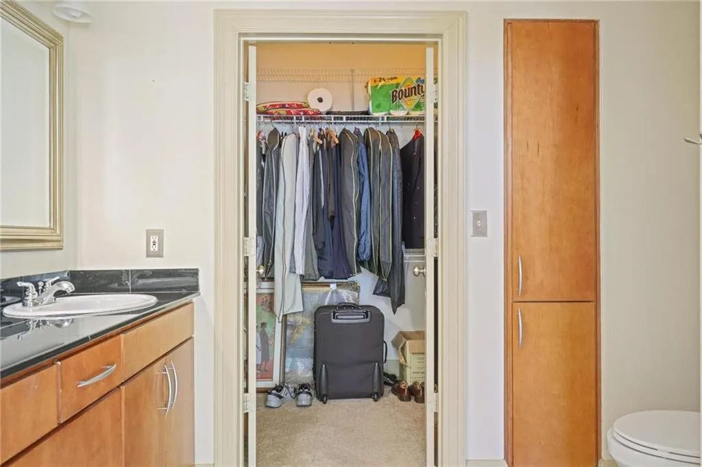 Bathroom featuring vanity and toilet