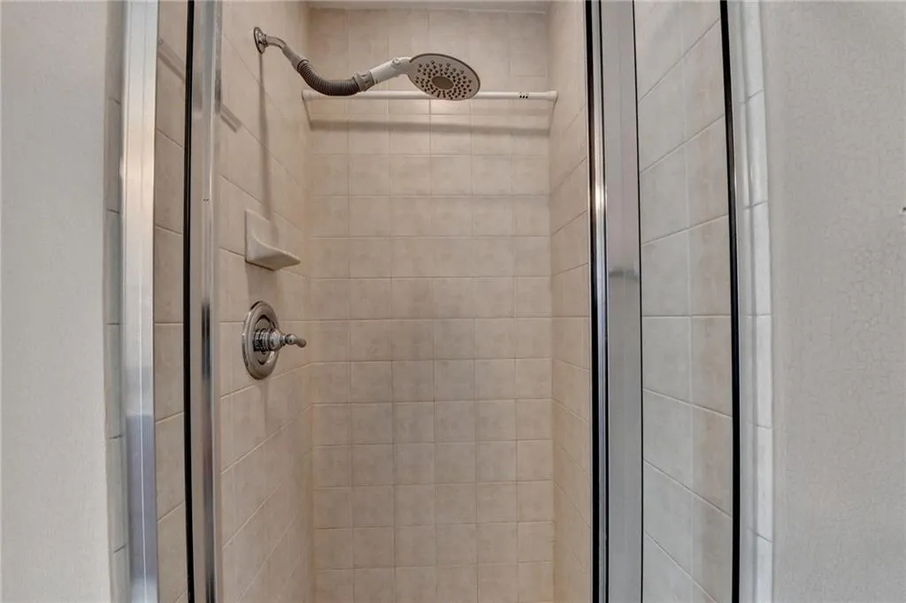 Details with a shower with door