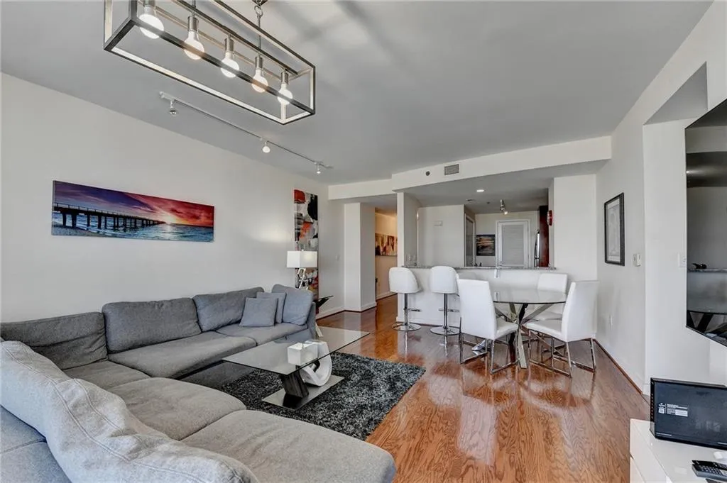 Living room with hardwood / wood-style floors