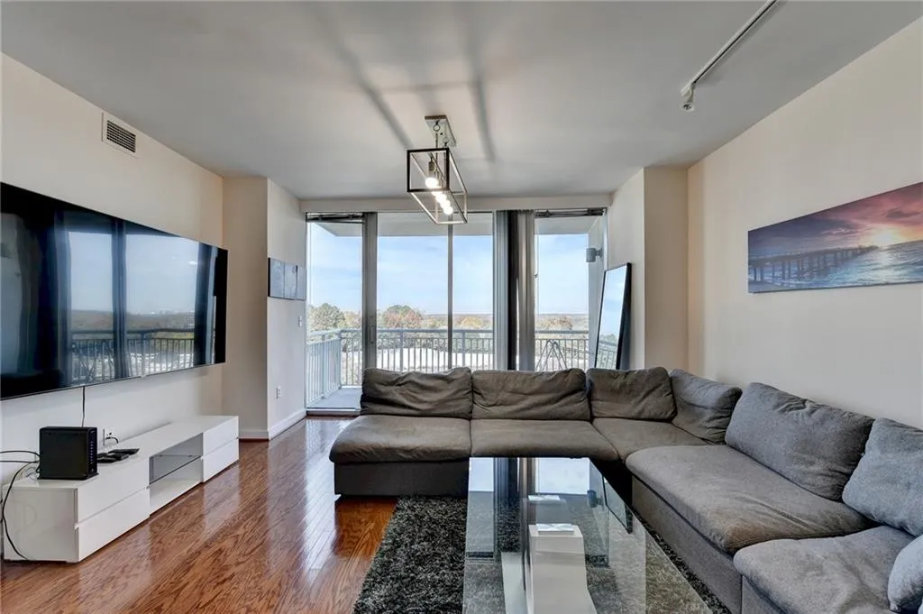 Living room featuring dark hardwood / wood-style floors