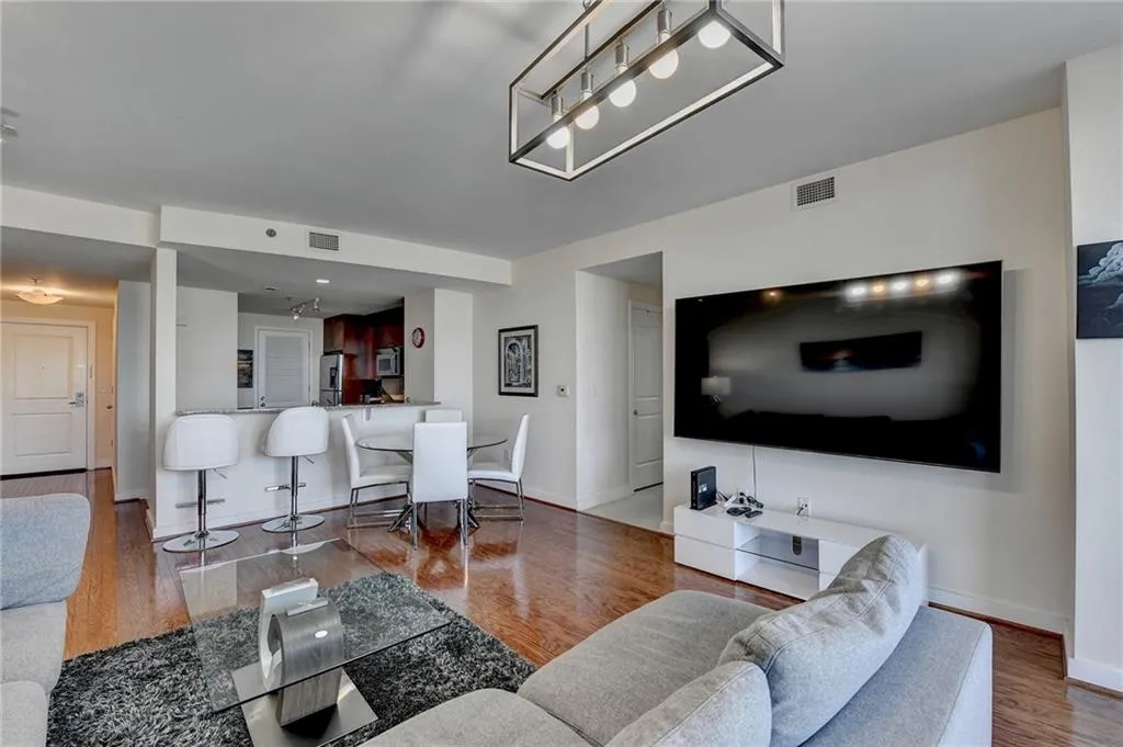 Living room featuring hardwood / wood-style flooring