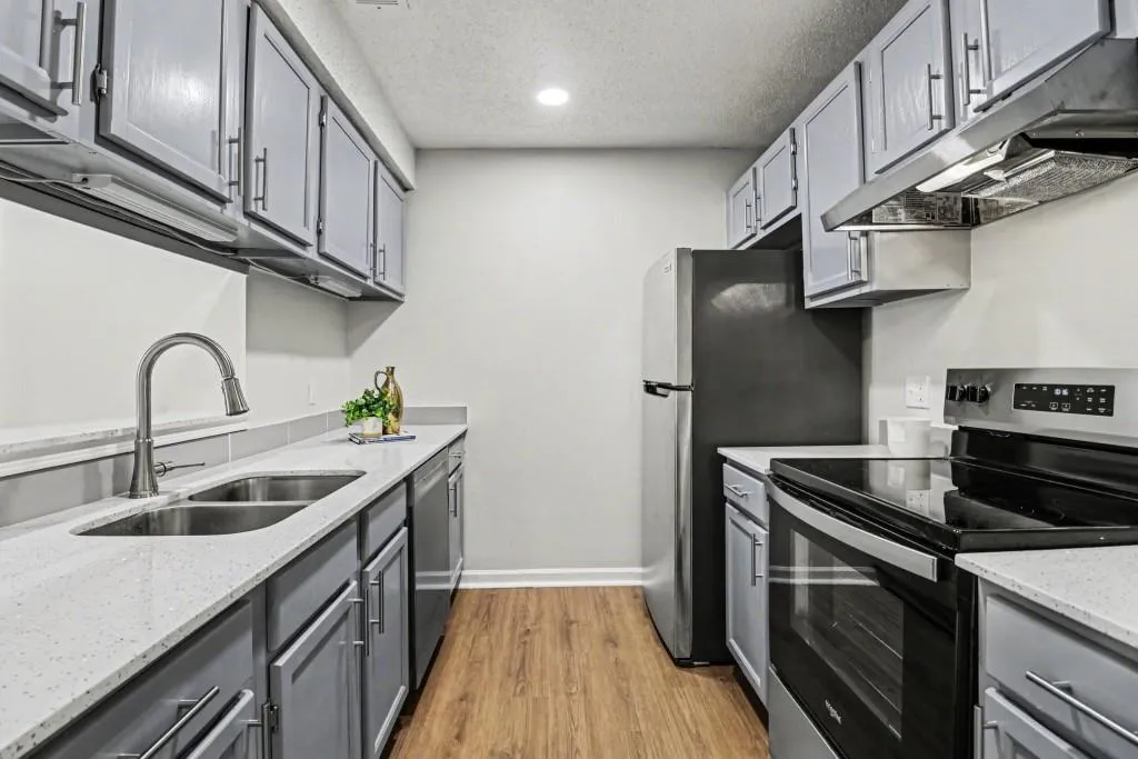 Updated Kitchen With Stone Counters & Stainless Steel Appliances