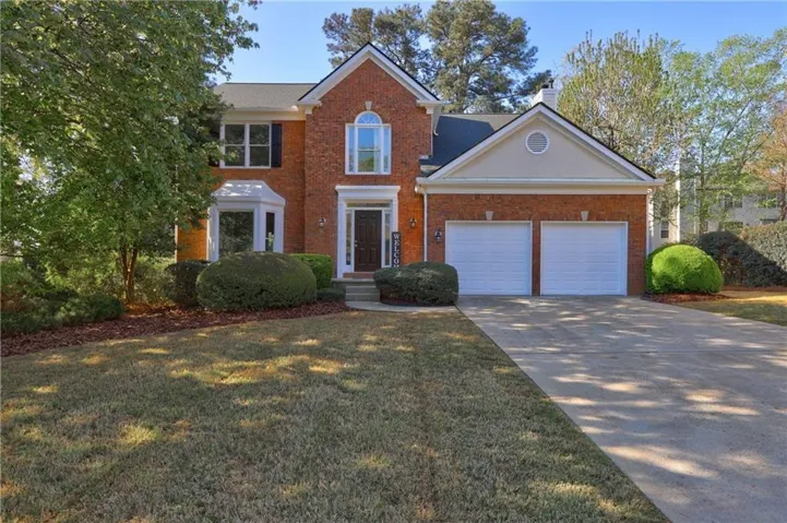 Brick exterior with an arched window accent