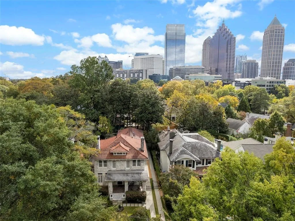 Birds eye view of property with a city view