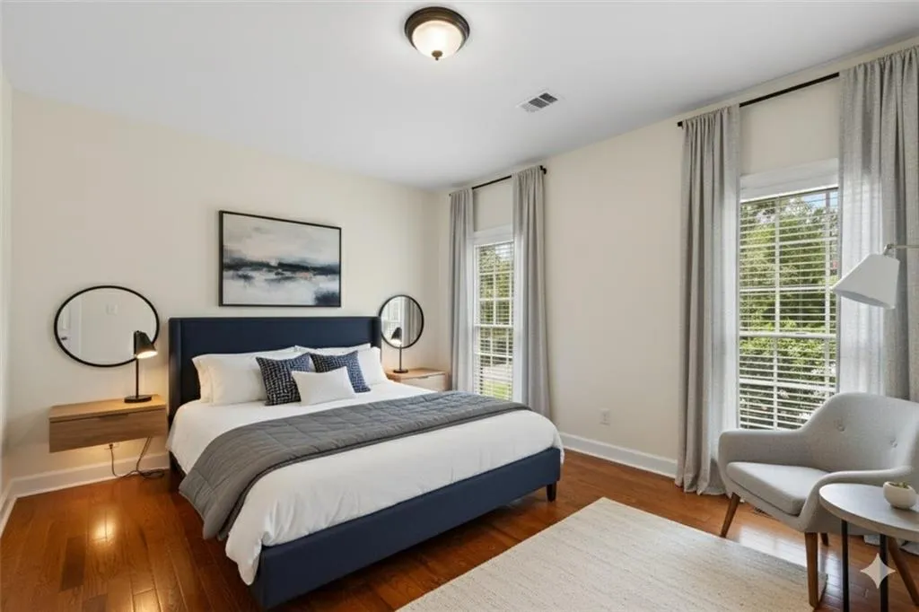 VIRTUALLY STAGED SECONDARY BEDROOM- HAS ITS OWN BATHROOM.
