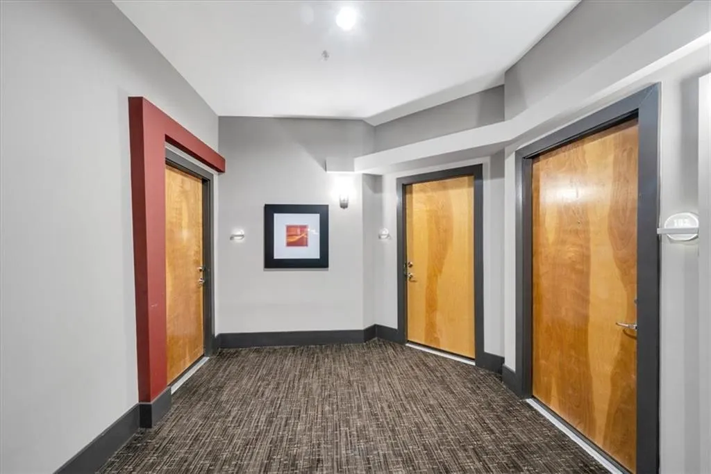 View of unit 101 hall and front door