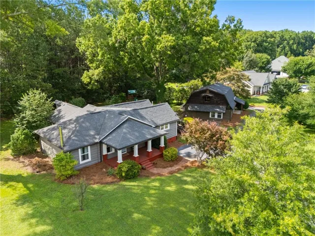 Two beautifully updated homes situated on 2.4 acres