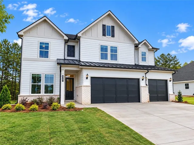 Quick Move In-Elson by McKinley Homes | 3,319 Sq. Ft. Spacious two-story design with 4 bedrooms, 3.5 baths, a flexible bonus room, guest suite on the main level, covered patio, and 3-car garage.