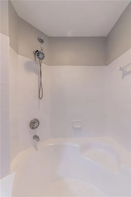Bathroom featuring  shower combination
