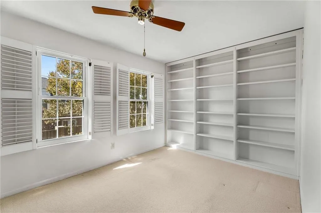 3rd bedroom with Gorgeous built in book shelves. 3rd bedroom with Gorgeous built in book shelves.