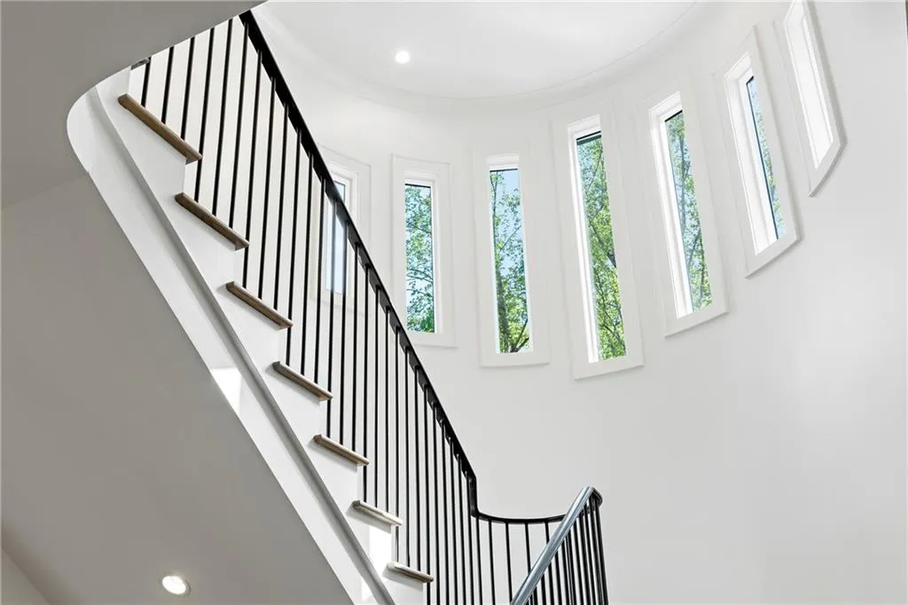 Stairwell to the second floor with exquisite visual architectural design