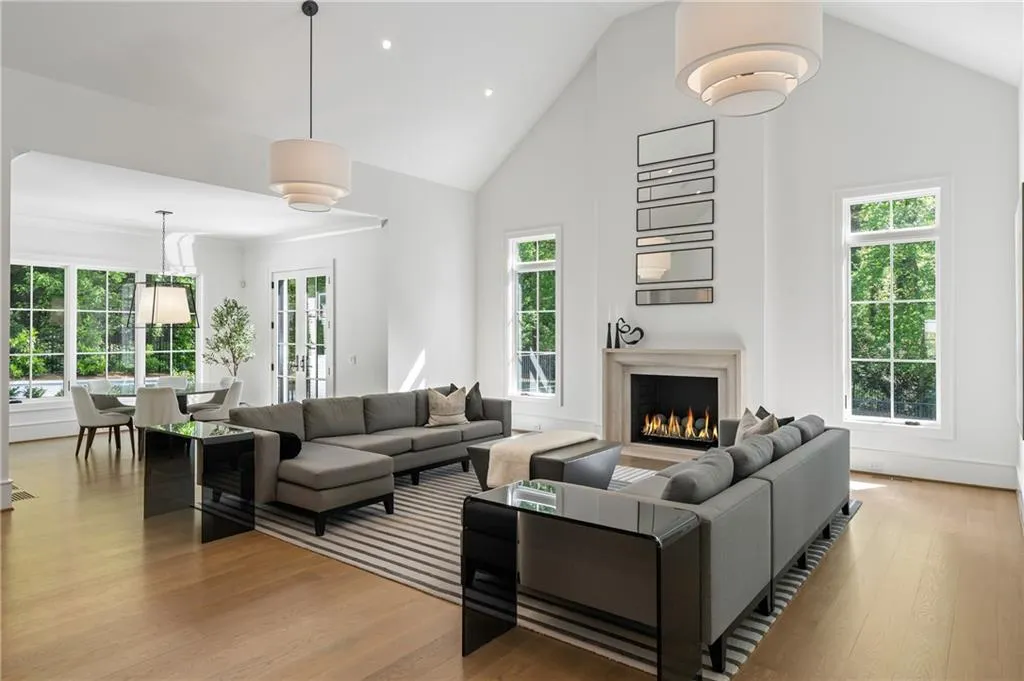 Open concept living space from kitchen to the den creates an effortless space for entertaining