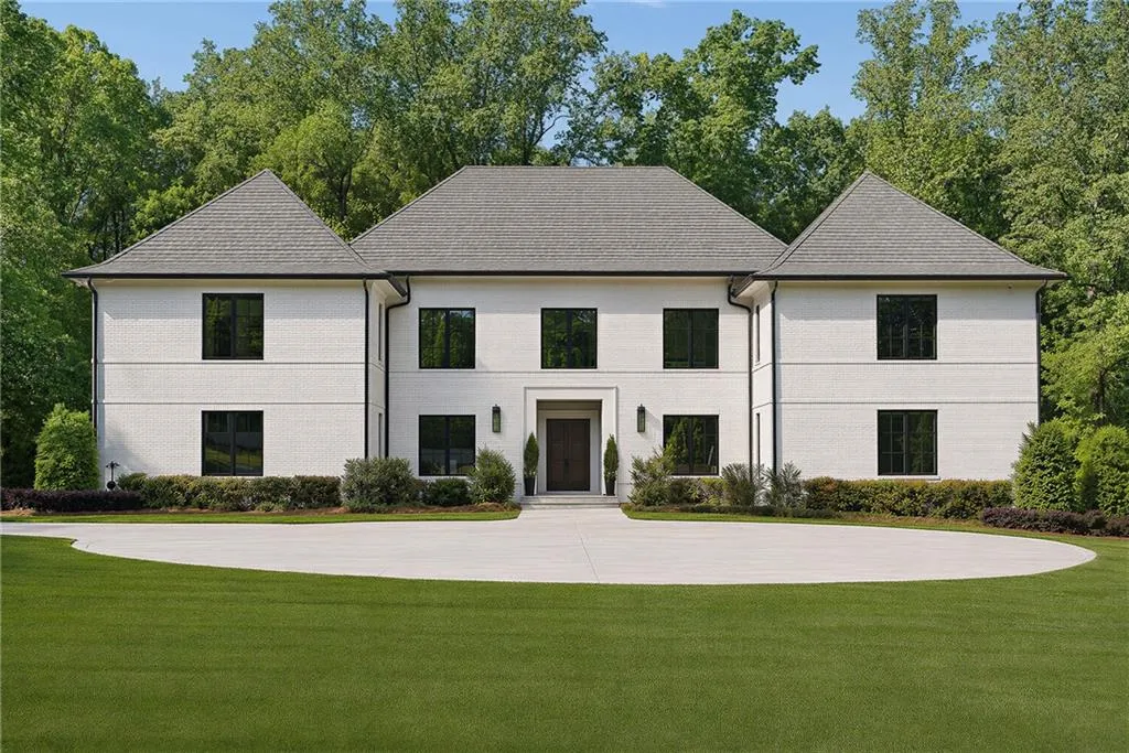 This timeless custom built gated estate is situated on nearly 6 acres of beautiful tree-lined property minutes to Chastain Park, Buckhead, Sandy Springs and esteemed private and public schools.