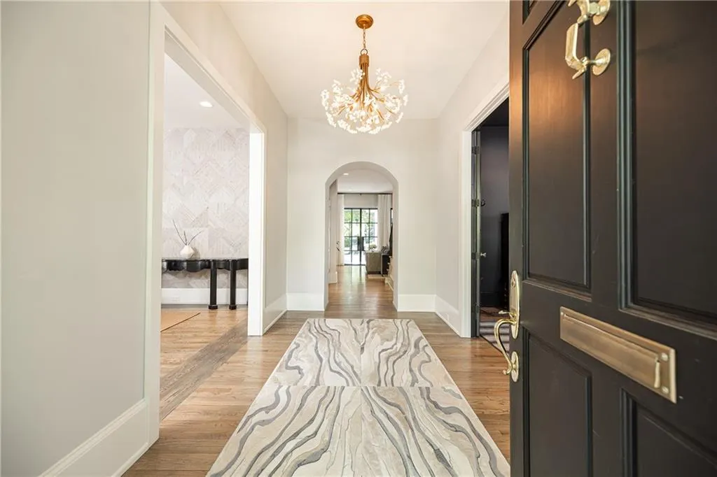 Elegant entry foyer with high ceilings and beautiful millwork