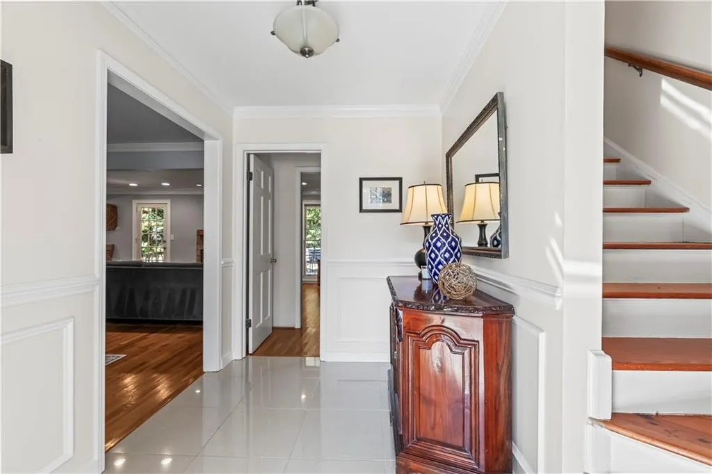 Tiled entrance foyer and plenty of natural l light, and a decorative wall