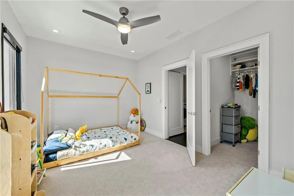 Bedroom featuring carpet flooring, recessed lighting, and a ceiling fan
