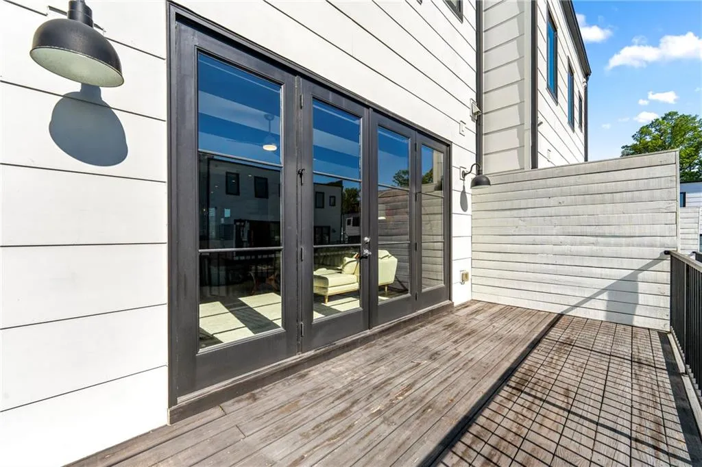 Wooden terrace with french doors