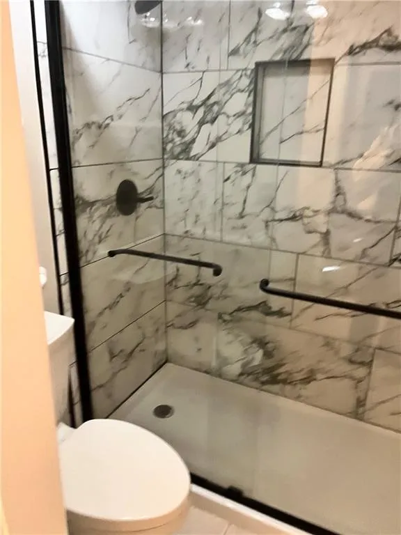 Bathroom with a stall shower