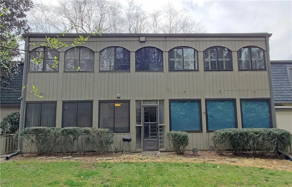 View of front of property with a front lawn