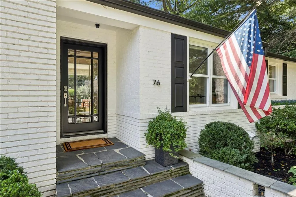 Property entrance with brick siding