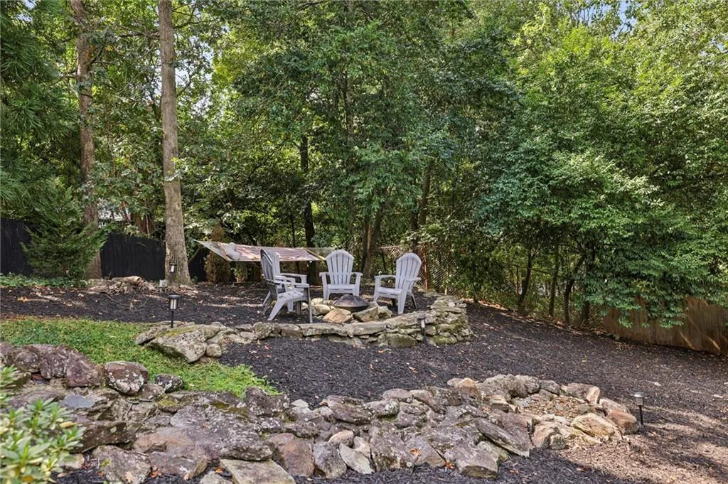 View of yard with a fire pit