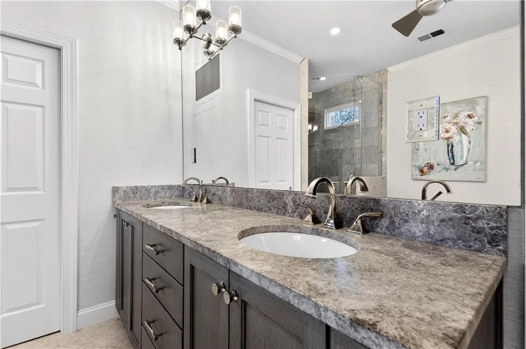 Double vanities in primary bathroom.