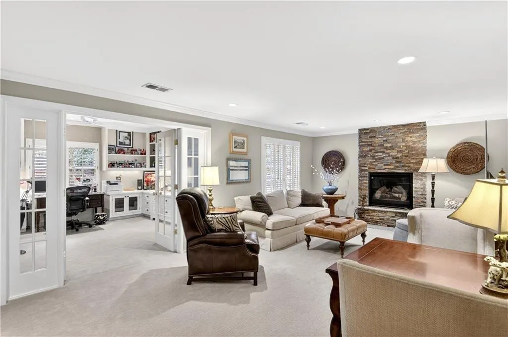 Fully finished Terrace level with fireplace, office, bar, bedroom, full bath and tons of storage.