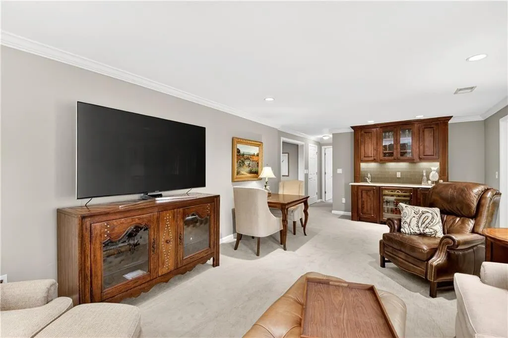 Finished basement with bar.
