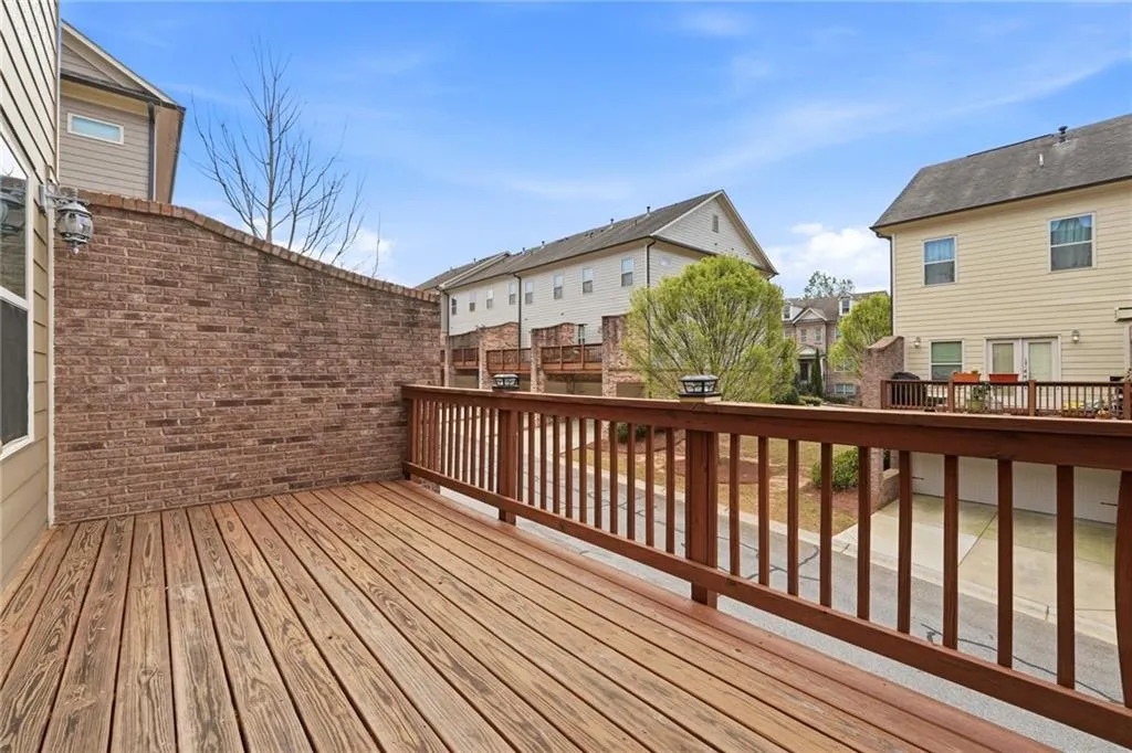 Wooden deck featuring a residential view