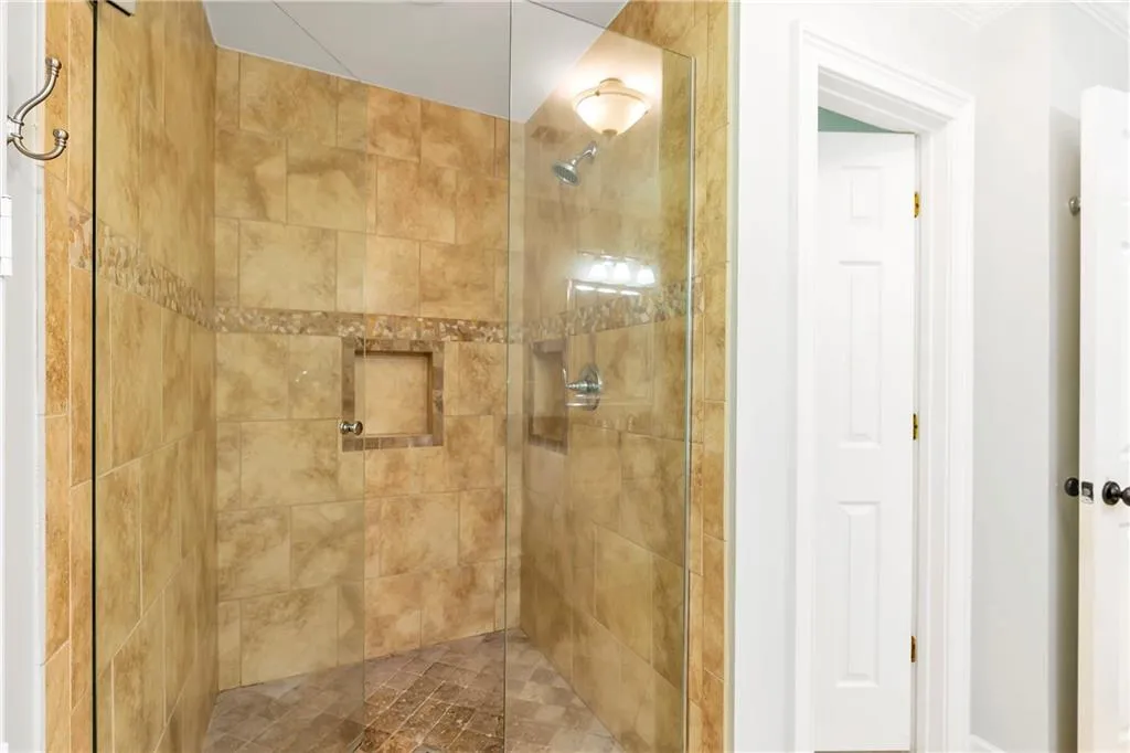 Bathroom with tiled shower