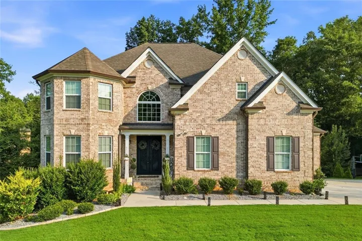 Gorgeous Three-Sided Brick Home on a beautifully landscaped Corner Lot in the desirable Whitestone community!