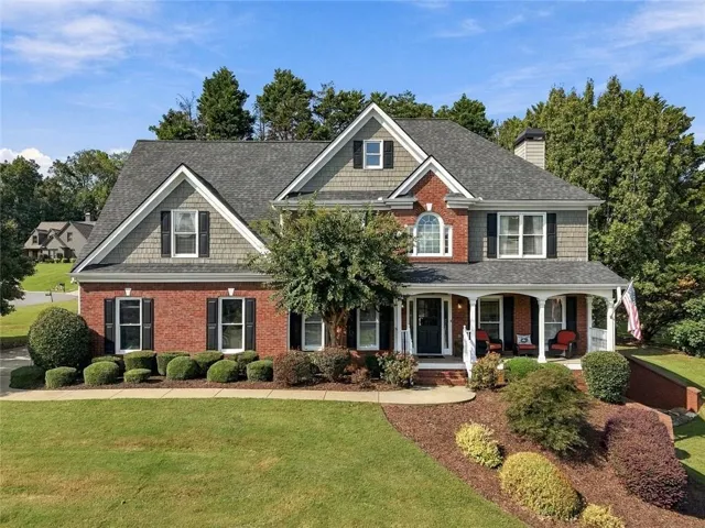 Brick and siding exterior with gabled roof lines